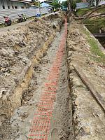 penimbunan dan pemasangan safety net kabel TM